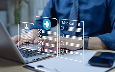 Healthcare data displayed in 3D in front of a computer screen. 